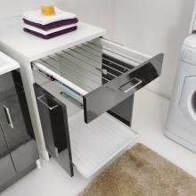 Laundry cabinet with extractable drying rack